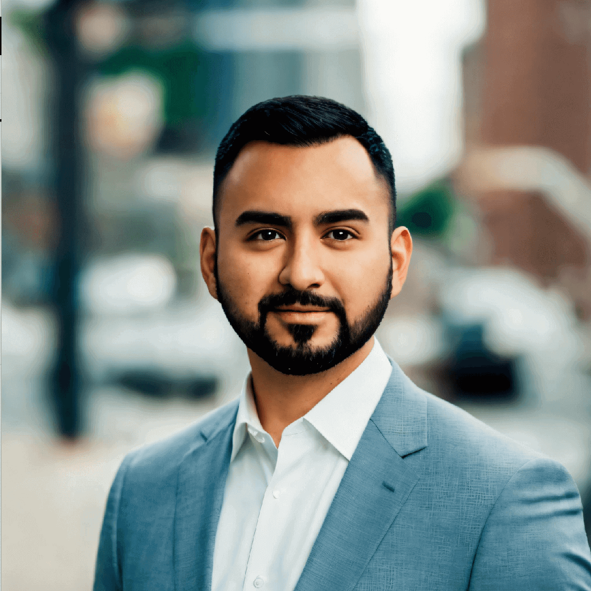 Serafin Lopez wearing a blue suit headshot